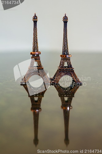 Image of Wedding rings on the Eiffel Tower figurines