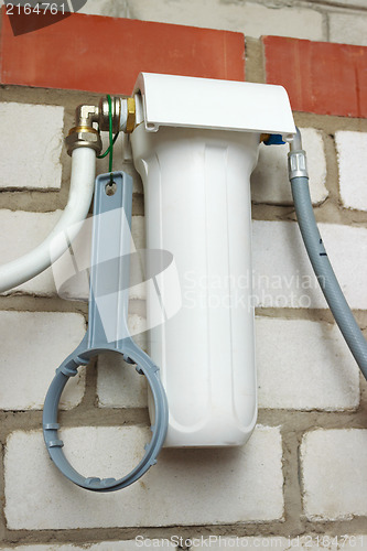 Image of Water filter with white housing