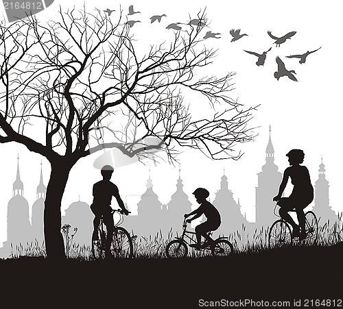 Image of Family on bicycle trip out of town