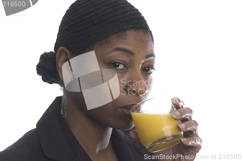Image of woman drinking orange juice
