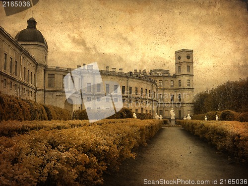 Image of Old classic palace with statues near main entrance  in grunge and retro style. Retro card. Vintage backgraund.