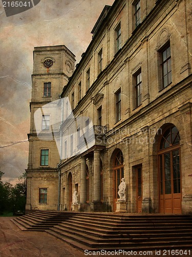 Image of Old classic palace with statues near main entrance  in grunge and retro style. Retro card. Vintage backgraund.