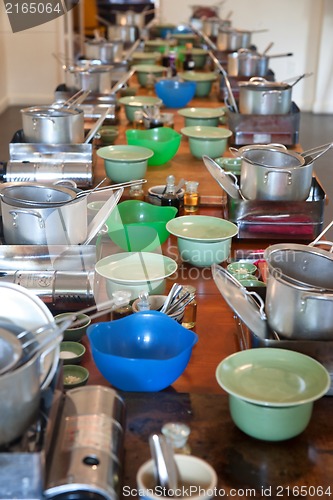 Image of cookware on long table