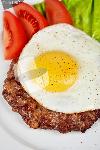 Image of steak beef meat with fried egg