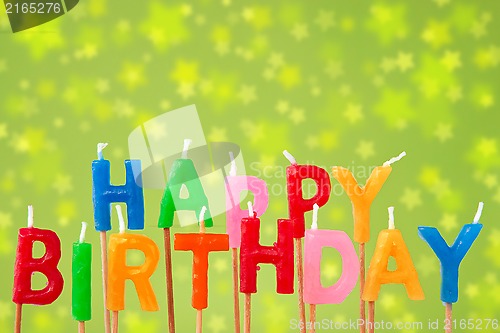 Image of Birthday candles on blurry background 