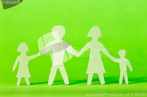 Image of Paper family on green background