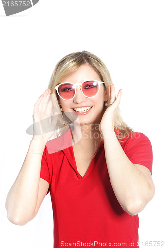 Image of Trendy woman in red sunglasses