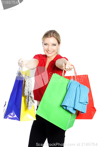 Image of Happy woman shopping for clothing