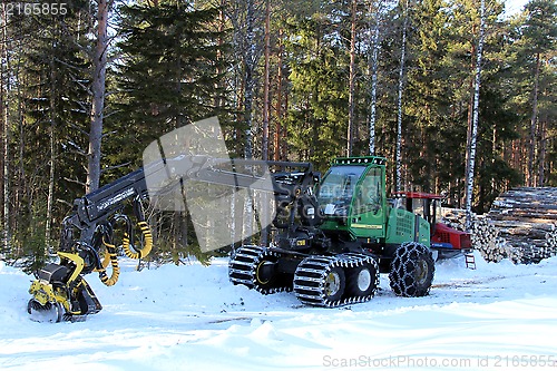 Image of Wheeled Harvester by Forest Logging Site