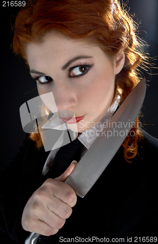 Image of crazy schoolgirl with knife