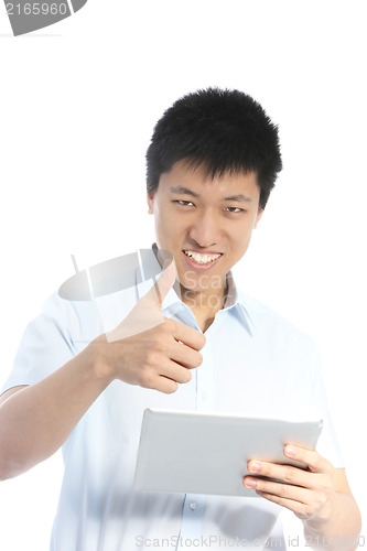 Image of Smiling Asian man giving a thumbs up