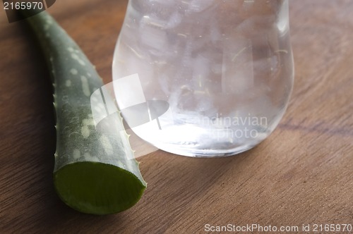 Image of aloe vera juice with fresh leaves