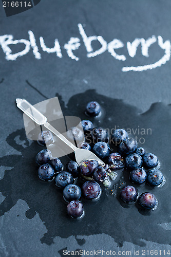 Image of Fresh blueberries and fork