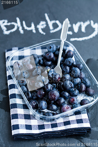 Image of Fresh blueberries and fork
