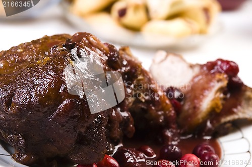 Image of Delicious Scrambled Grilled meat with cranberry sauce 