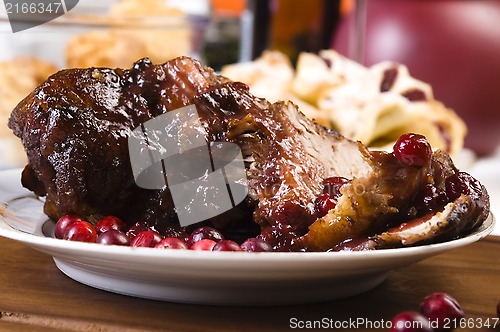 Image of Delicious Scrambled Grilled meat with cranberry sauce 