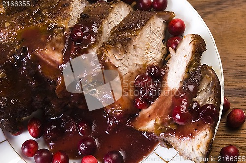 Image of Delicious Scrambled Grilled meat with cranberry sauce 