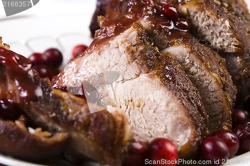 Image of Delicious Scrambled Grilled meat with cranberry sauce 