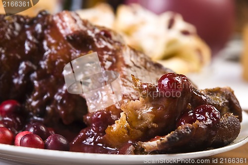 Image of Delicious Scrambled Grilled meat with cranberry sauce 