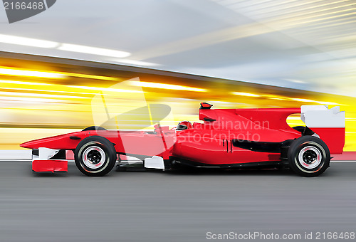 Image of formula one race car on speed track