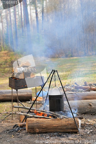 Image of Kettle over campfire