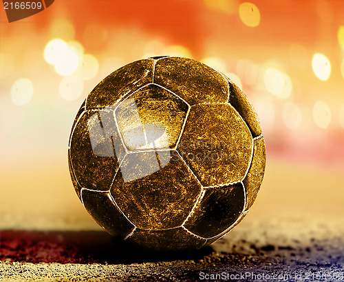 Image of golden ball on ground