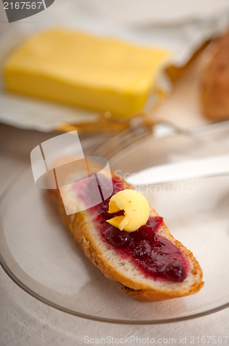 Image of bread butter and jam 