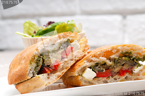 Image of ciabatta panini sandwichwith vegetable and feta