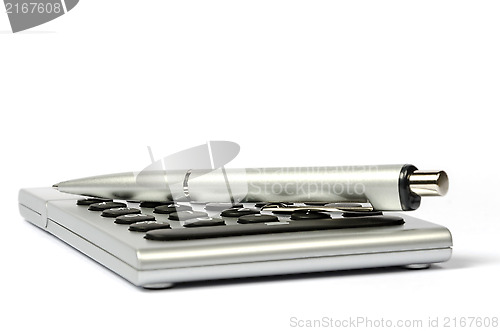 Image of A calculator and a pen on a white background