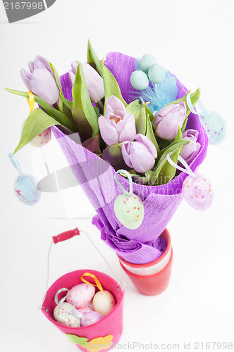 Image of Easter eggs with bucket and tulips