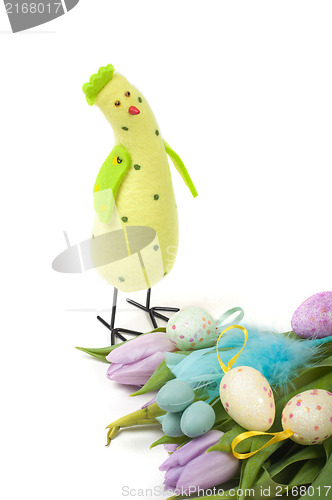 Image of Easter chicken with tulips and eggs