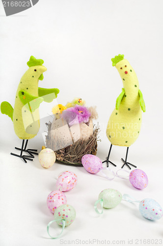 Image of Easter chicken family with tulips and eggs