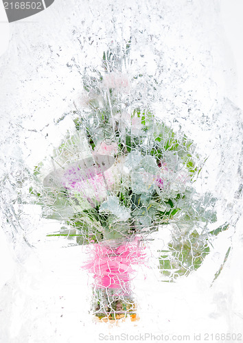 Image of delicate bouquet of flowers in the ice