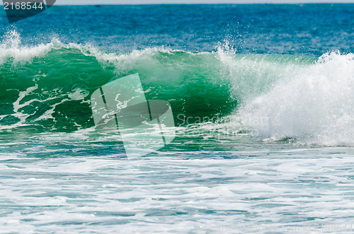 Image of ocean waves on a sunny day