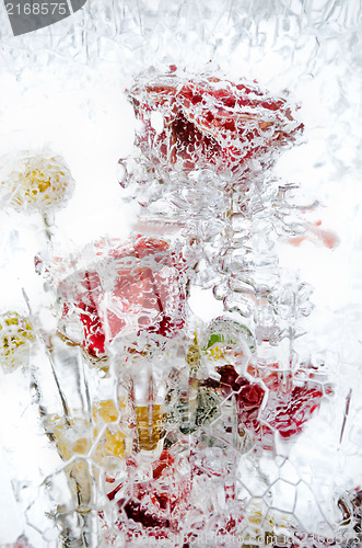 Image of delicate bouquet of flowers in the ice