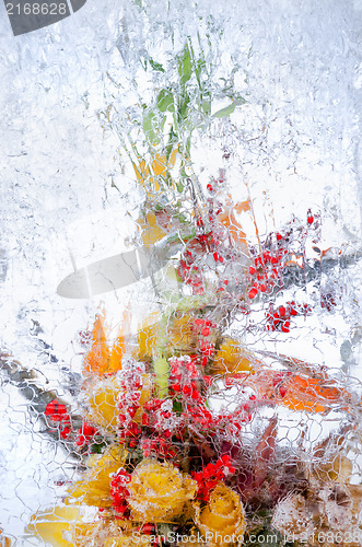 Image of delicate bouquet of flowers in the ice