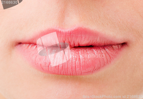 Image of Women's lips are very close