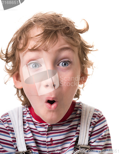 Image of curly-haired boy surprised