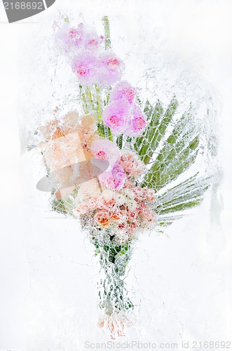 Image of delicate bouquet of flowers in the ice