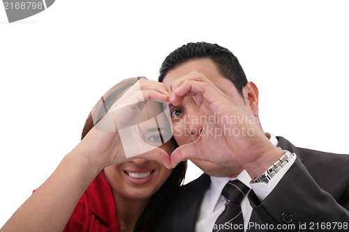 Image of Happy couple in love showing heart with their fingers 