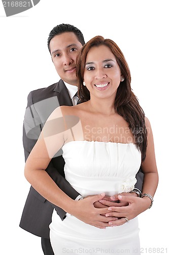Image of Happy young man hugging his girlfriend isolated on white backgro