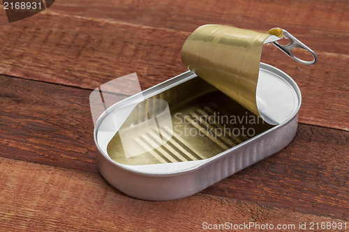 Image of empty open tin can