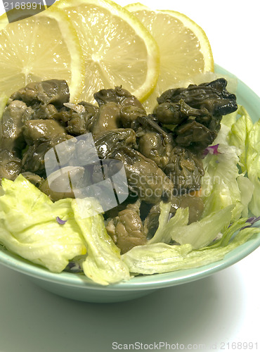 Image of smoked oyster salad  lemon slices lettuce