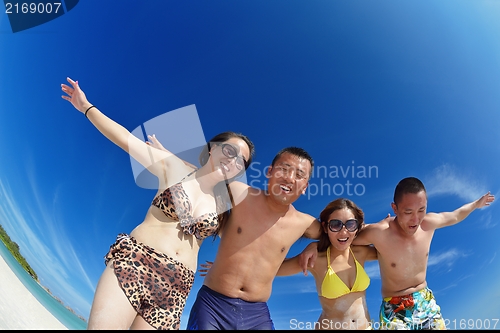Image of group of happy young people have fun on bach