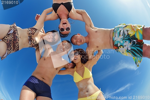 Image of group of happy young people have fun on bach