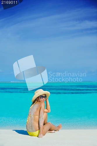 Image of beautiful  woman relax on tropical  beach