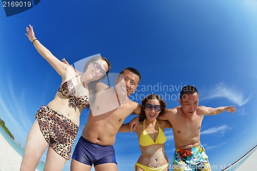 Image of group of happy young people have fun on bach