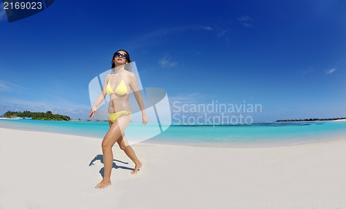 Image of beautiful  woman relax on tropical  beach