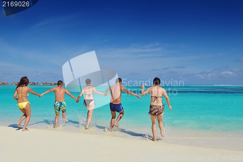 Image of group of happy young people have fun on bach