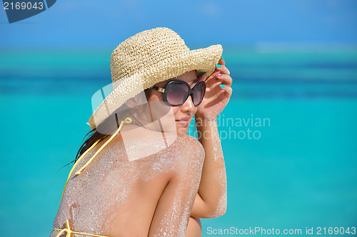 Image of beautiful  woman relax on tropical  beach